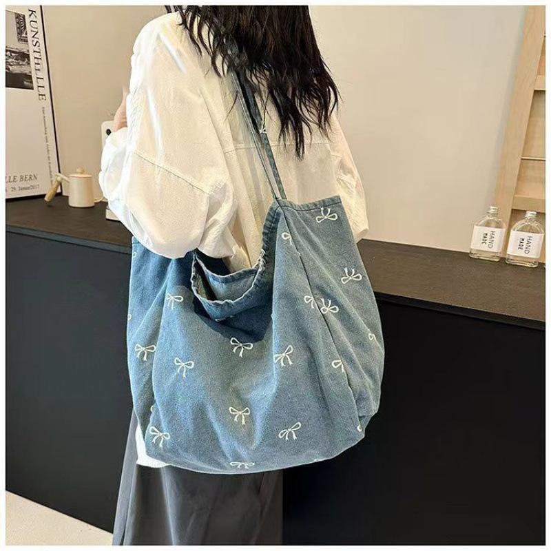 

New high-value denim canvas bag women s bow sweet and versatile tote bag large capacity casual shoulder bag