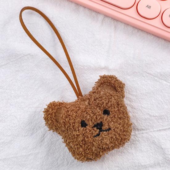Precioso llavero con decoración de oso y cabeza con tacto acogedor