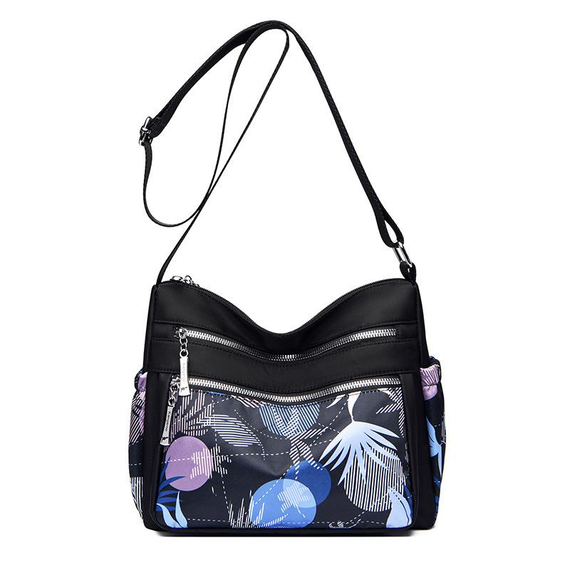 

Printed women s messenger bag Large capacity shopping backpack Simple commuter shoulder bag Trend anti-splashing nylon bag default