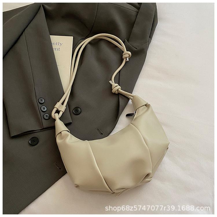 High-end dumpling bag women's 2025 summer new fashion pleated messenger bag Korean version niche single shoulder armpit bag
