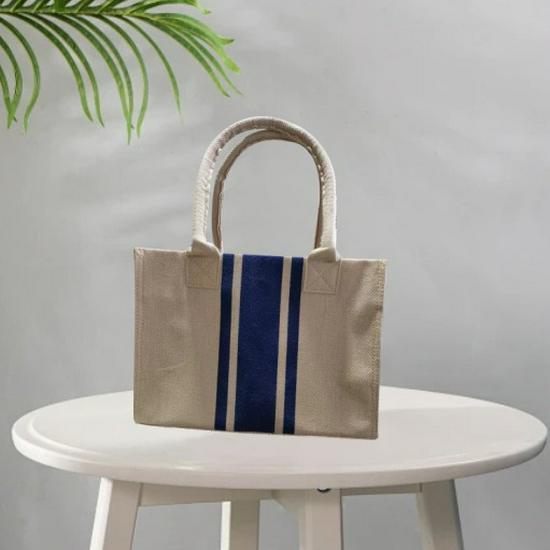 Koreanische Damen-Aktentasche aus gestreiftem Canvas: Minimalistisch, Geräumig, Einseitige Umhängetasche für Berufspendler.