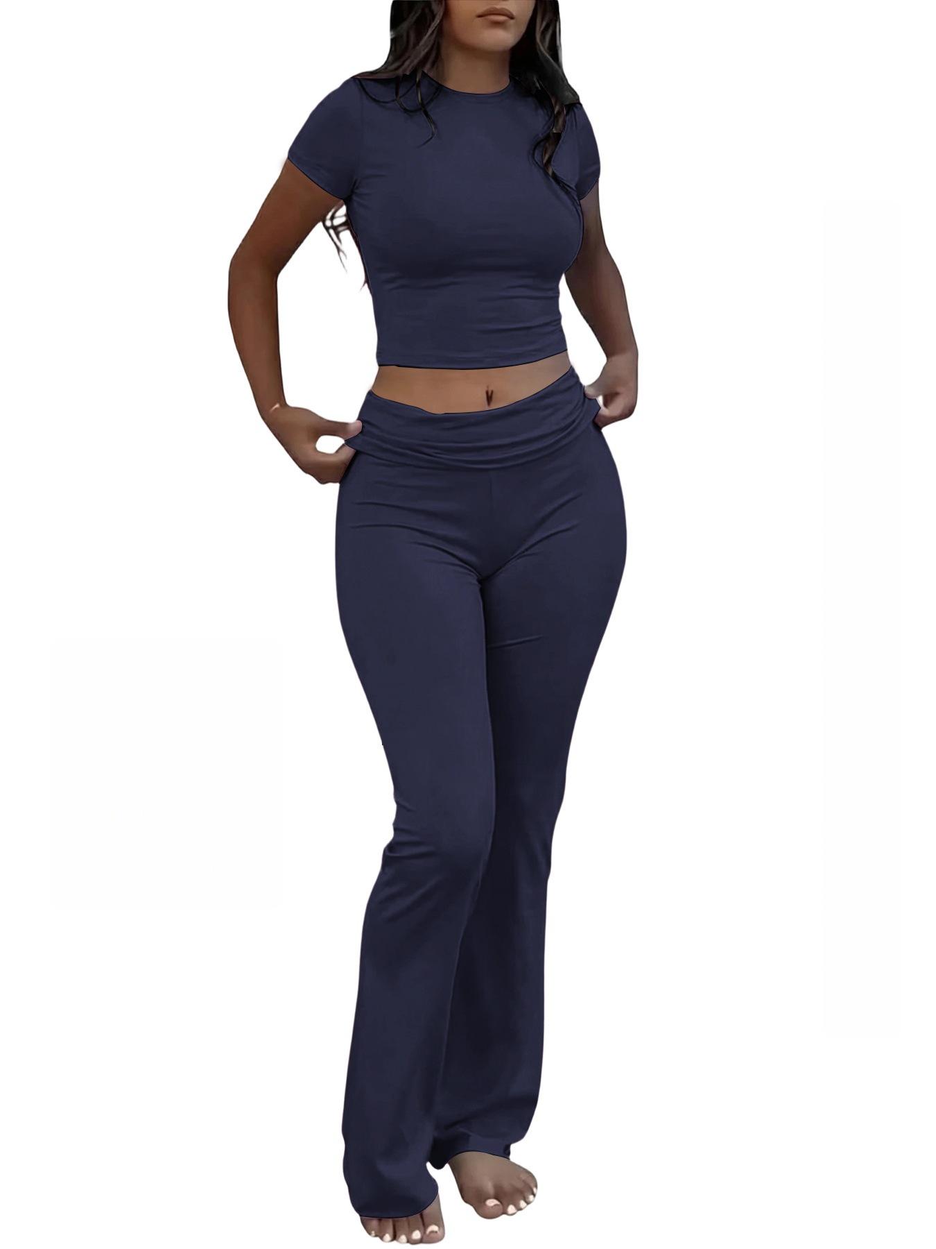 

Casual Women s Two-piece Workout Set: Round Neck T-shirt & Low-waisted Flared Pants S темно-синього кольору