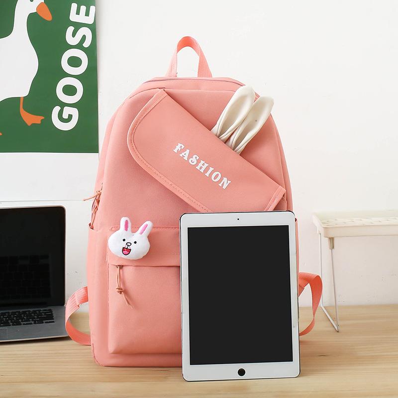 New girl backpack, primary and secondary school schoolbag, make-up bag, four-piece rabbit ear class backpack