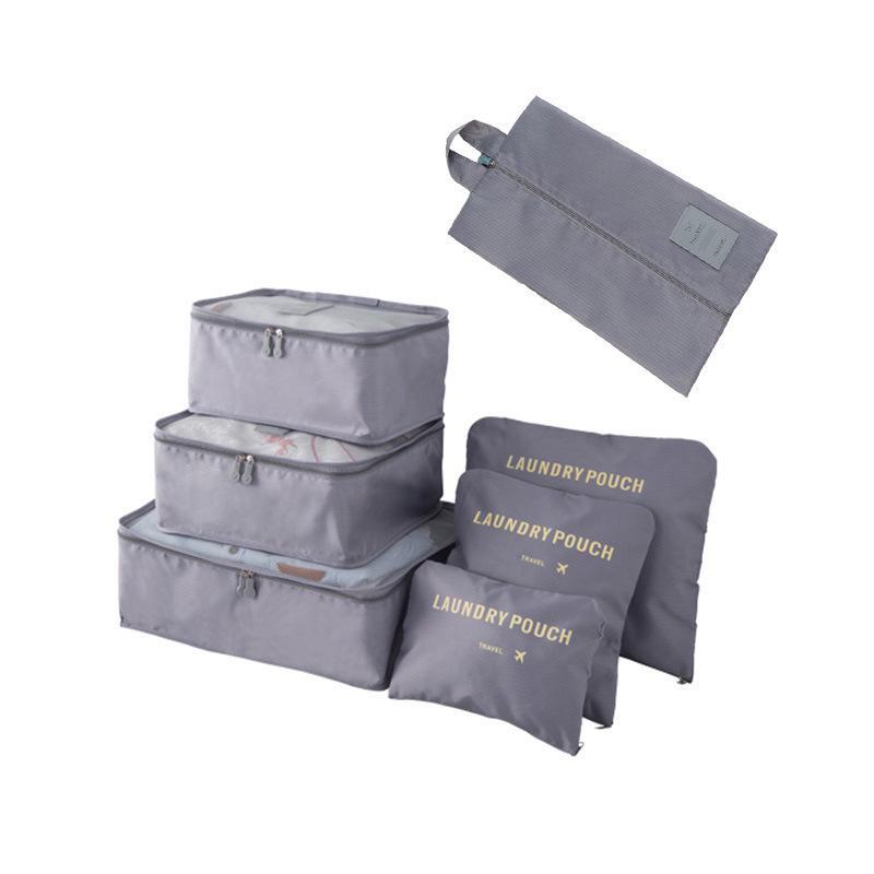 "Portable Travel Luggage Organizer: 7-Piece Storage and Shoe Bag Set"