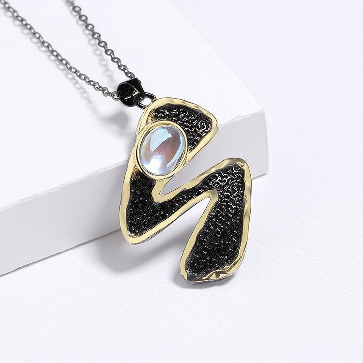 Jewelry Women'S Creative Moonstone Pendant Necklace Women'S Black Gold Versatile Sweater Shiny Irregular Pendant