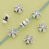 50PCS R931 Alloy Double-Sided Flower Spacer Beads