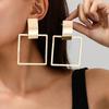 Trendy personality exaggerated geometric oval hollow square circle versatile earrings suitable for street photography