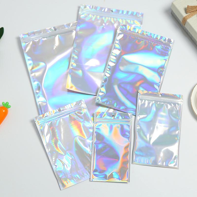 50 Stück schillernde Zip-Lock-Beutel Beutel Kosmetik Plastik Laser Holografisch Make-up Aufbewahrungsbeutel Hologramm Reißverschlussbeutel Geschenkverpackung