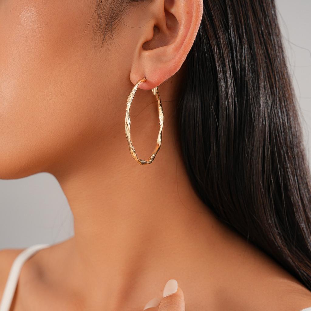 Cold wind geometric round twisted steel needle earrings environmentally friendly versatile earrings feeling earrings