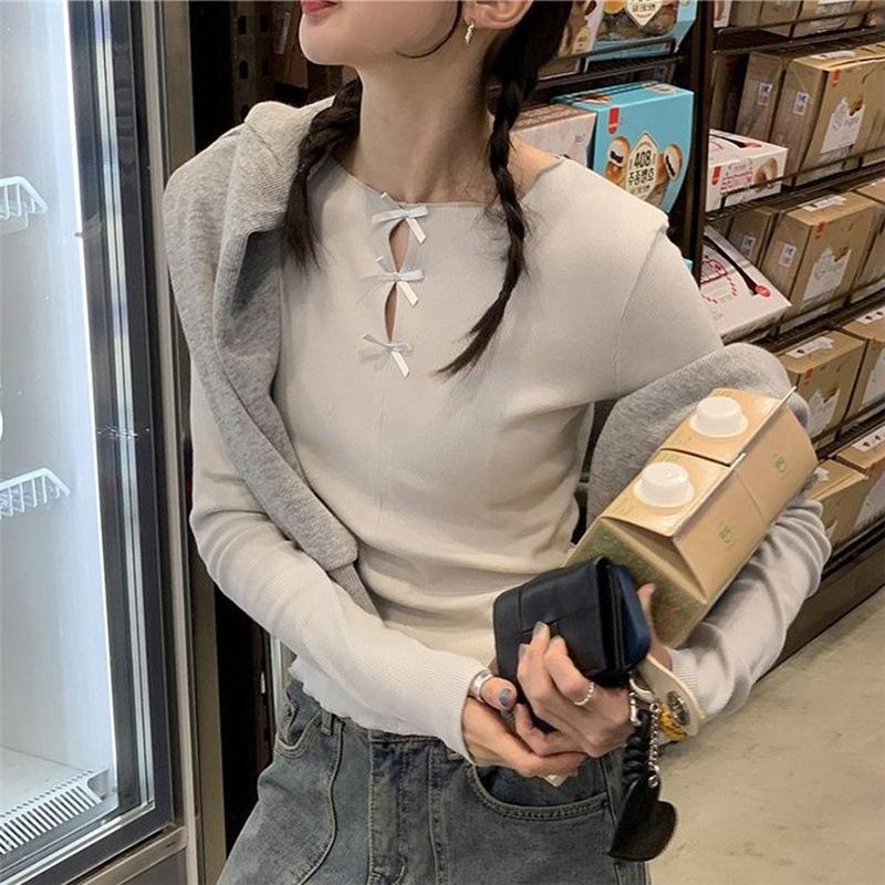 Women's Spring Casual Solid Color Round Neck Hollow Bow Knit Top