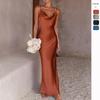 Women's Urban Fashion Solid Color Dress with Deep V-neck, Slim Fit, and Spaghetti Straps for Spring/Summer 2024.