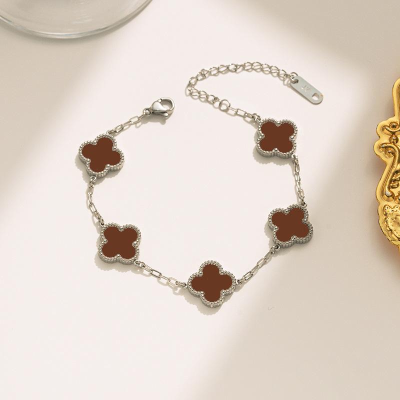 Bracciale di alta moda in acciaio al titanio con quadrifoglio a quattro foglie double-face per donna, stile elegante