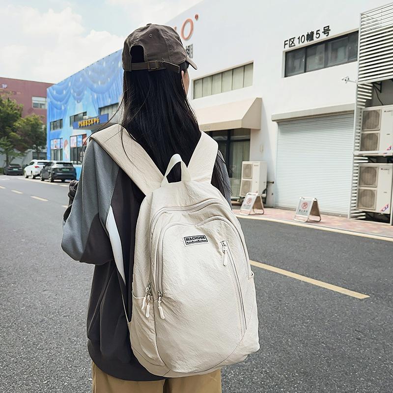 Schoolbag Korean version of simple student backpack male and female college students casual versatile backpack sports cycling tooling bag