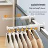 Portable Telescopic Folding Clothes Hanger: No-Punch Storage Rack for Travel and Hotel Use