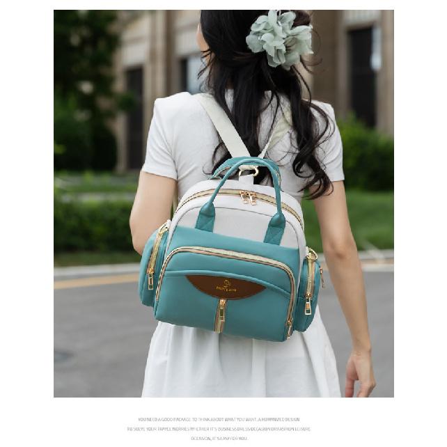 New mommy bag, multi-functional, large capacity, lightweight, with separate compartments for wet and dry items, can be carried as a backpack or