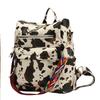 Neuer PU Retro Rucksack mit großer Kapazität für Reisen, Kuhmuster, schlichter britischer Stil, schräg über die Schulter tragbar, für Damen
