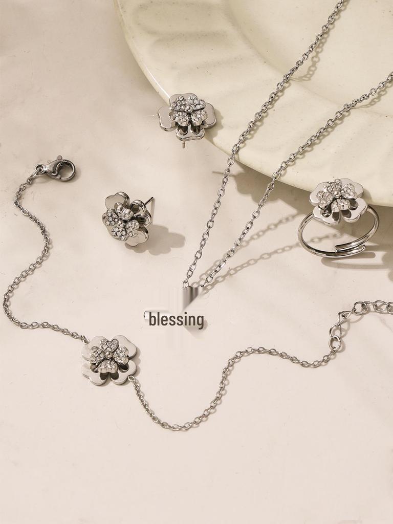 European & American Light Luxury Clover Jewelry Set: Stainless Steel, Zirconia-Embedded, Versatile Necklace, Bracelet, Ring & Earrings for Women.