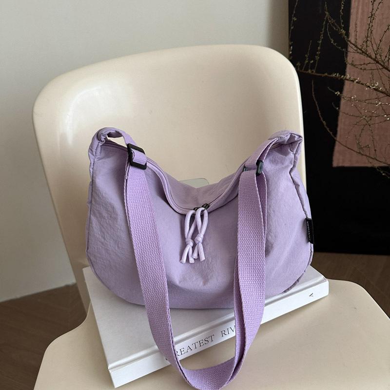 Simple literary dumpling bag women 2025 new niche casual shoulder bag light bag solid color fashion messenger bag