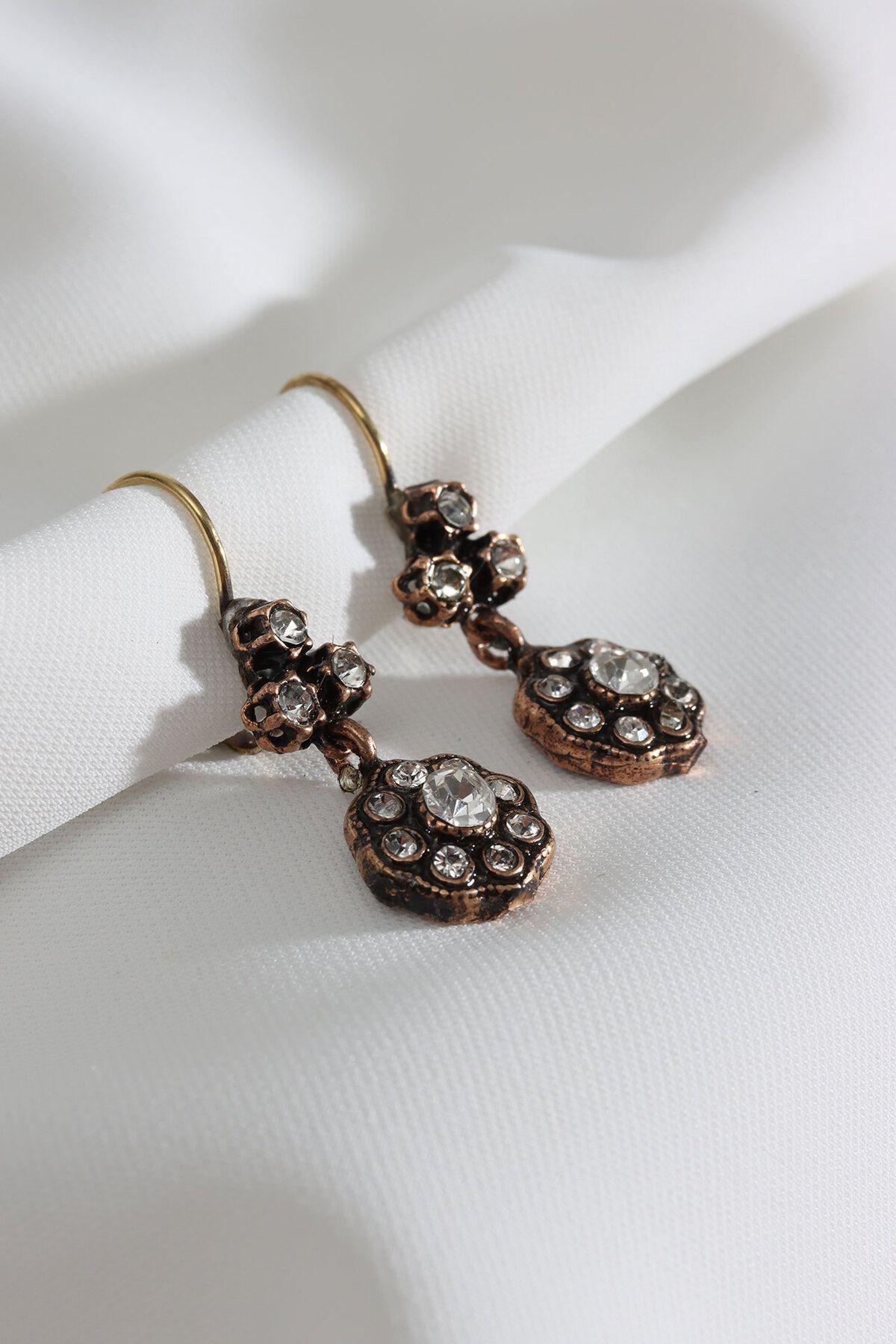 

Настоящие женские серьги с камнями