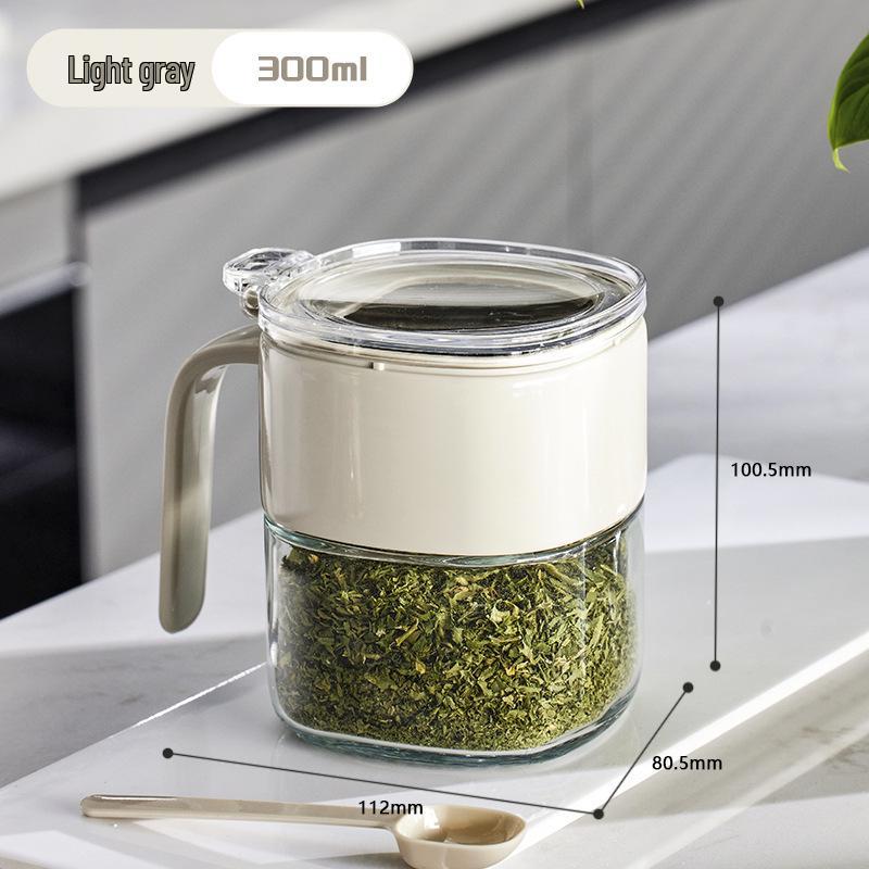 

Elegant Press-Top Glass Seasoning Jar with Spoon and Sealed Flip Lid for Salt and MSG.