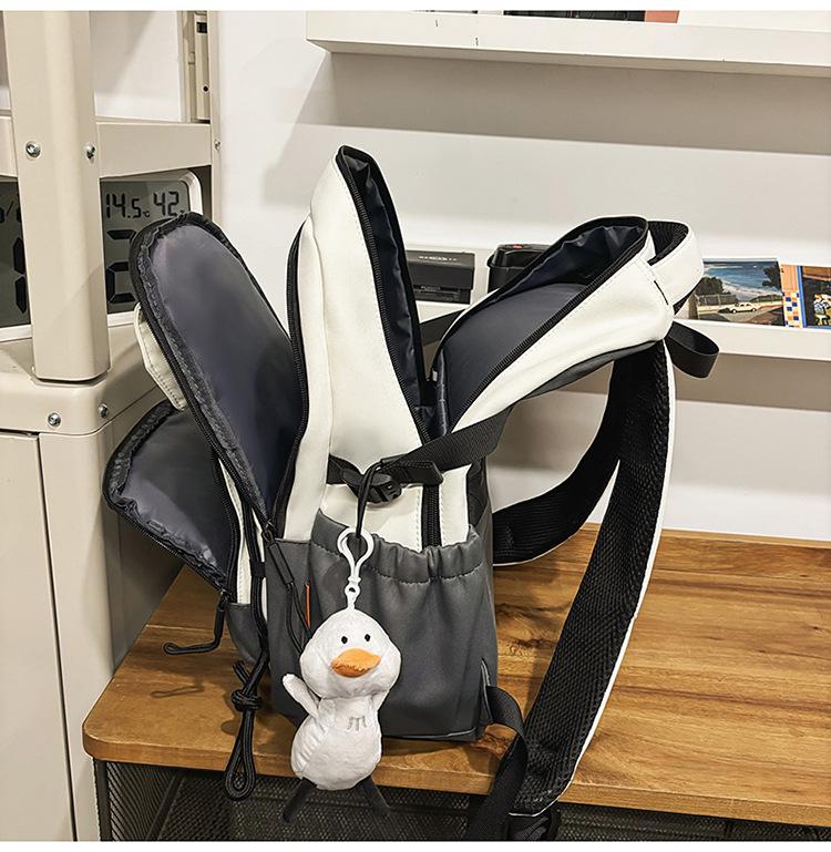 Lulu Japanese Casual Backpack Set: Large Capacity Schoolbag for College, Junior High Students, and Men & Women's Portable Use.