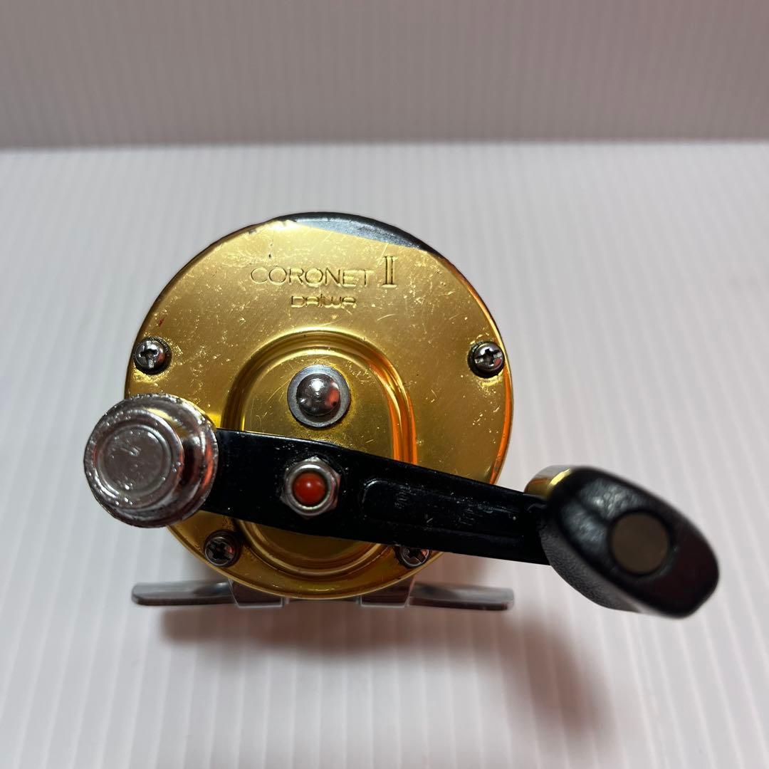 Used CORONET II Double Axis Reel Gold/Silver