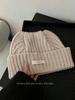 Korean order% wool vertical pattern cold hat women's big head circumference shows the face, cute cat ear hat multi-color knitted hat