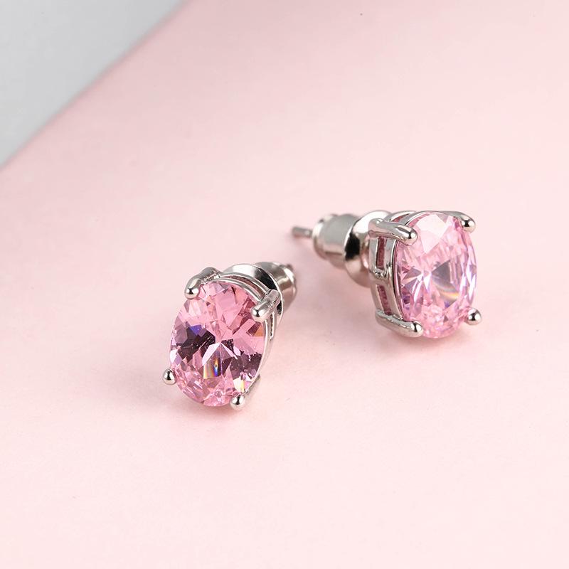 

Минималистичные овальные серьги-гвоздики с опалом — стильный и универсальный дизайн с четырьмя зубцами для женщин