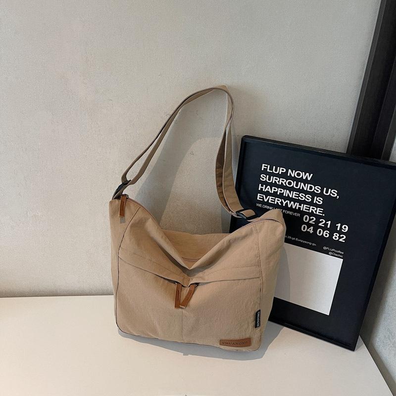Canvas bag women's large-capacity new versatile shoulder messenger bag cloth bag class commuter tote bag