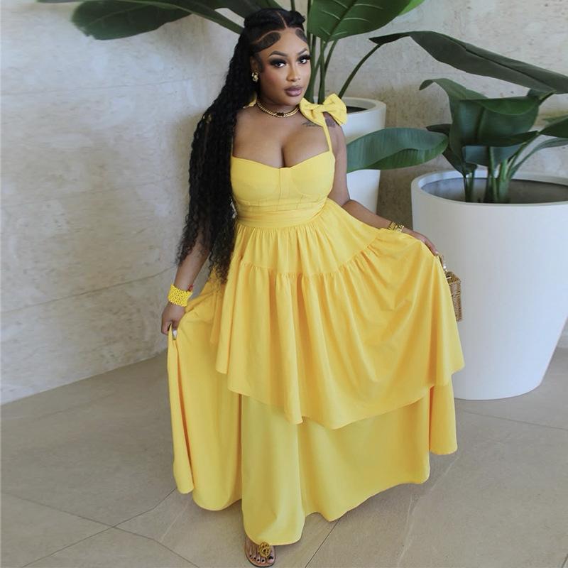 In stock, European and American women's clothing spring and summer new bow suspender V-neck ruffle edge long dress dress