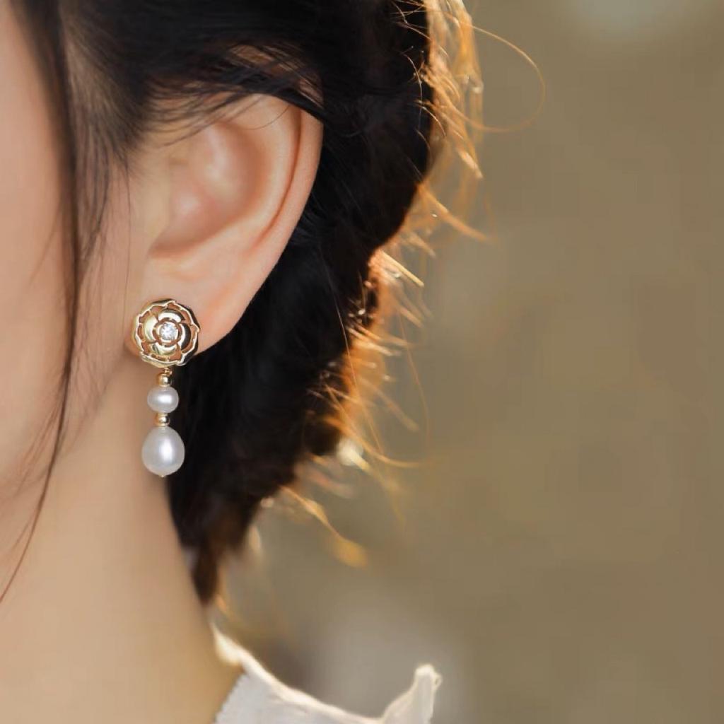 Natural freshwater camellia pearl stud earrings women's niche hollow design sense S925 silver needle simple Korean long earrings