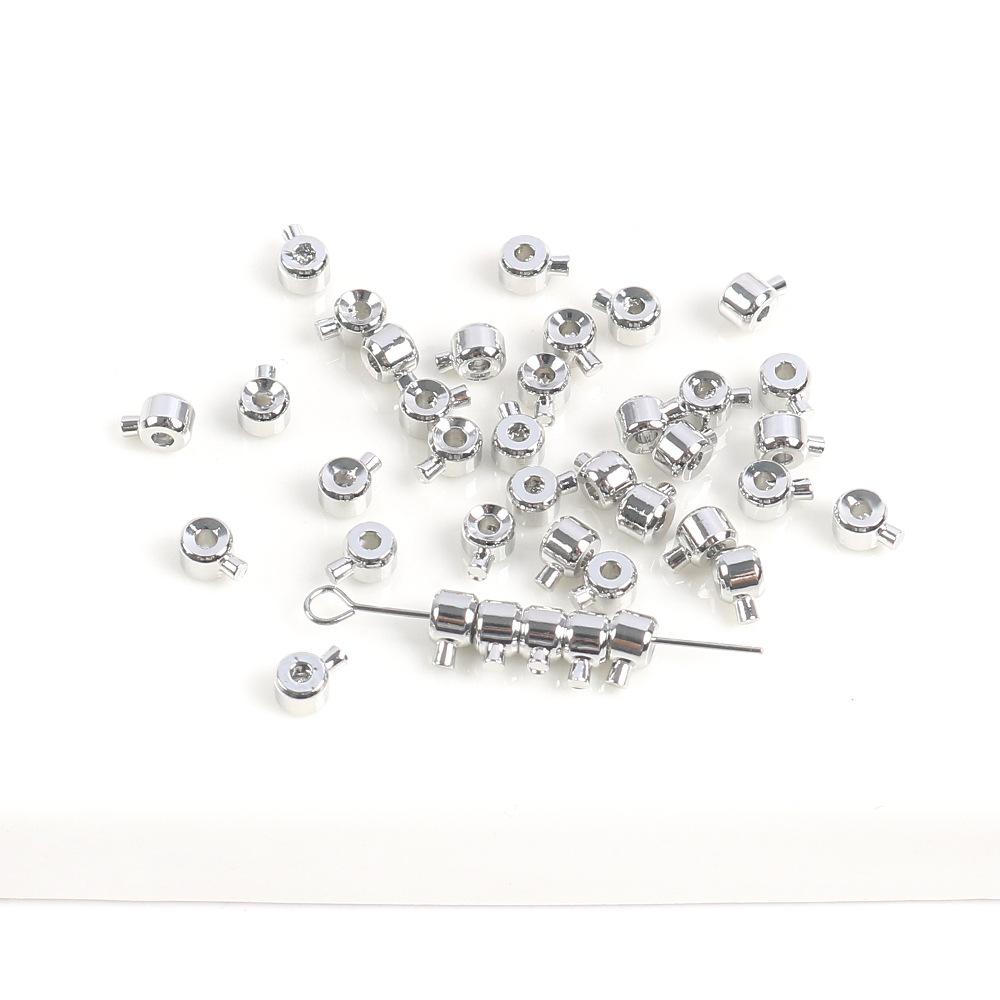 

Покрытое медью настоящее золото Сделай сам Позиционирующие бусины для скороварки Позиционирующая пряжка Завершающая пуговица Браслет-ожерелье Ювелирные аксессуары 10 pcs