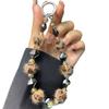 Herbst Winter Bommel Handykette Acryl Unregelmäßiger Stein Kurz Leopardenmuster Hängekette Kristallperlen Handyband Großhandel