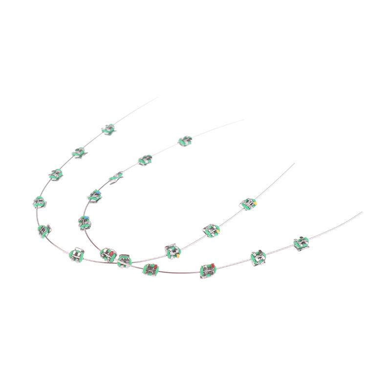 2 Stück Mode Split-Typ Mini Bunte Brackets Fake Zahnspangen Ohne Haken Temporäre Zahndekoration Metallbracket Zahnwerkzeug