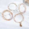 Korean version of fashion stretch line multi-layer bead women's bracelet set retro bohemian fringed pendant hand jewelry women