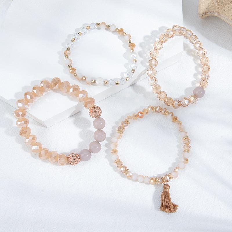 Korean version of fashion stretch line multi-layer bead women's bracelet set retro bohemian fringed pendant hand jewelry women