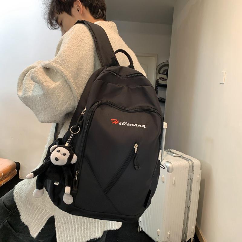 

High-end large-capacity backpack male versatile solid color schoolbag female college student junior high school backpack student backpack чорний