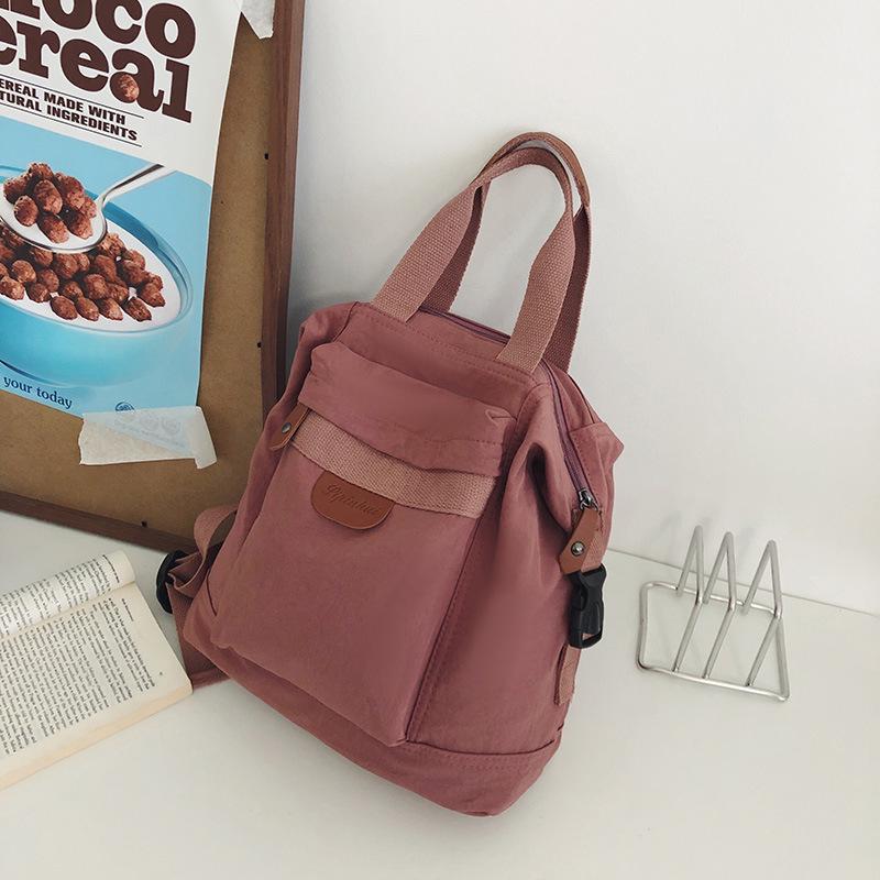 

Женский ретро холщовый рюкзак-тоут - Повседневный, легкий, универсальный модный для студенток, для поездок на работу или для повседневного использования в корейском стиле. розовый