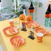 Zestaw zastawy stołowej na imprezę tematyczną Halloween: Obrus dyniowy, Talerzyki i kubki jednorazowe