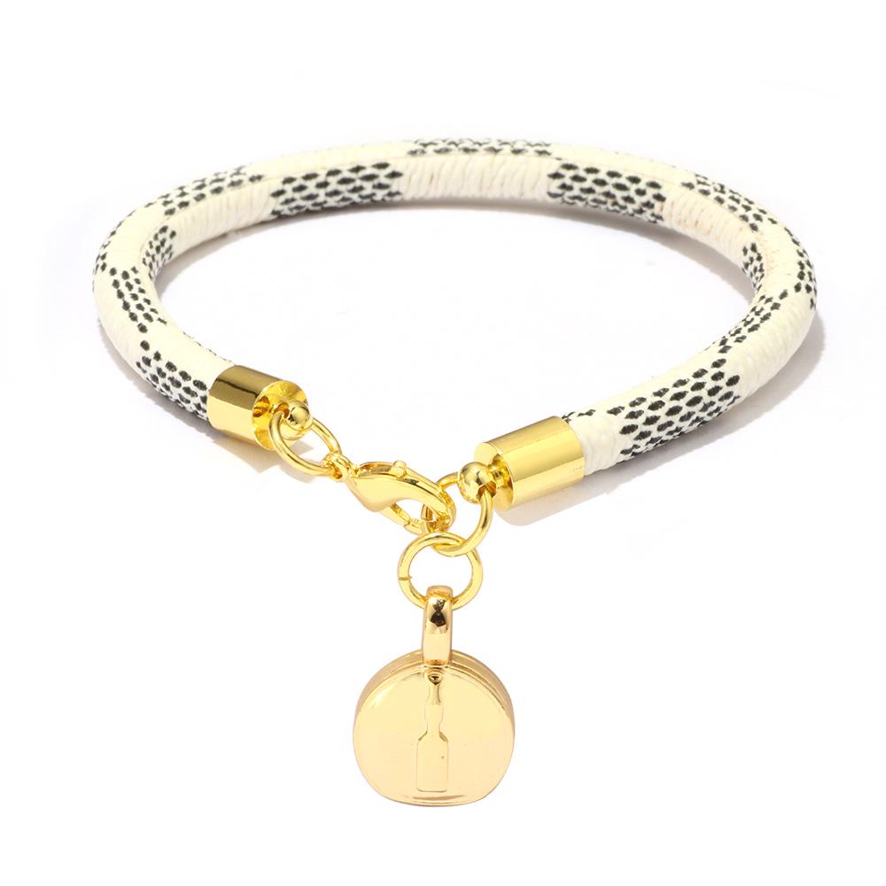 High-End Fashion Stripe Leather Bracelet with Gold-Plated Metal Accents
