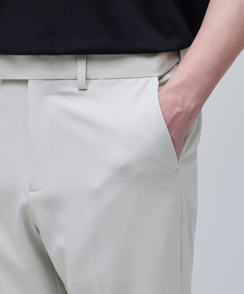 MUSINSA STANDARD Relaxed Tapered Hidden Banding Crop Slacks [Dusty Cream]
