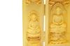 This natural boxwood (Tsuge) Buddhist triad features three Buddha figures: Shaka Nyorai, Amitabha Nyorai, and Yakushi Nyorai. Approximately 10cm tall.