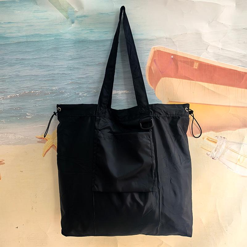Eco-Friendly Foldable Shopping Tote with Buckle, Drawstring Closure, and Single Shoulder Strap