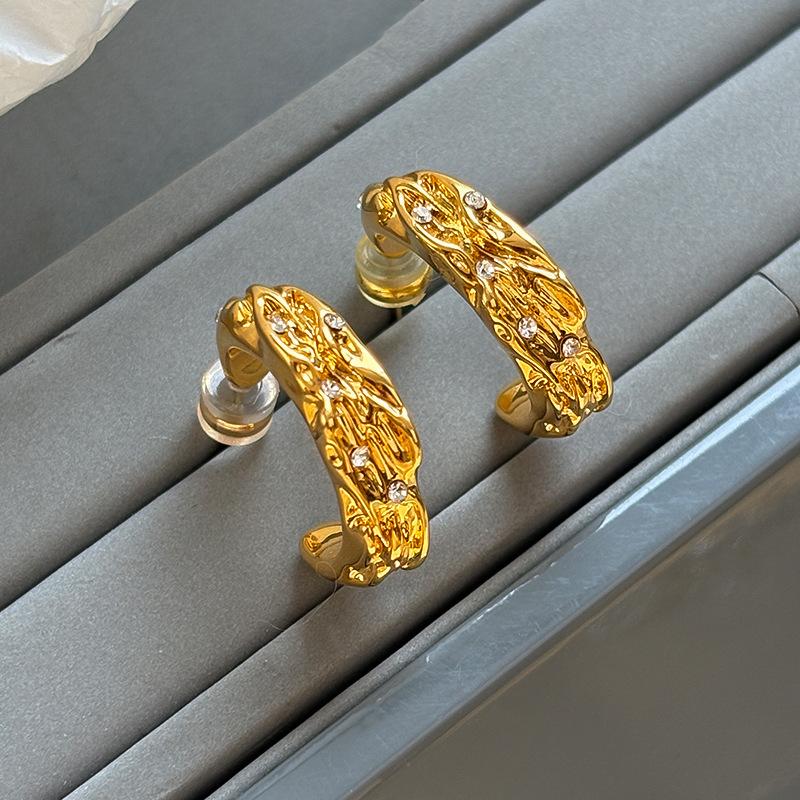 

Sterling silver irregular texture stud earrings new popular high-end earrings temperament light luxury accessories women s models