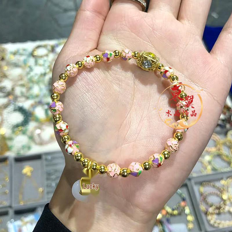 Pink Cloisonné Enamel  Ping an Kou  Bracelet with Ash-Glazed Porcelain and Gold Foil.