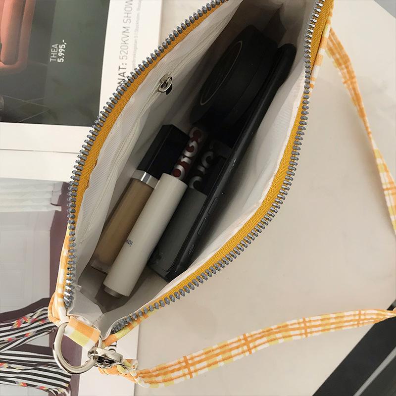 Sommerliche, schlichte und modische orange karierte Tasche im gleichen Stil, Crescent Art Bag, eine Schultertasche für die Achsel