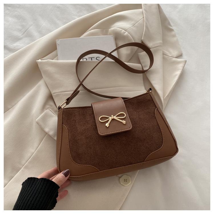 

Popular fashion new women s shoulder bag 2025 solid color foreign style saddle bag premium texture commuter handbag