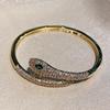 Vintage Green-Eyed Serpent Bangle: Exotic Snake Evil Eye Bracelet for Women
