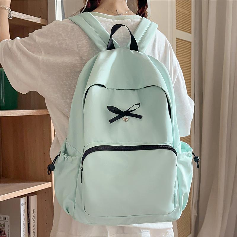 Ballet style bow small schoolbag ins niche junior high school students light travel leisure solid color versatile backpack