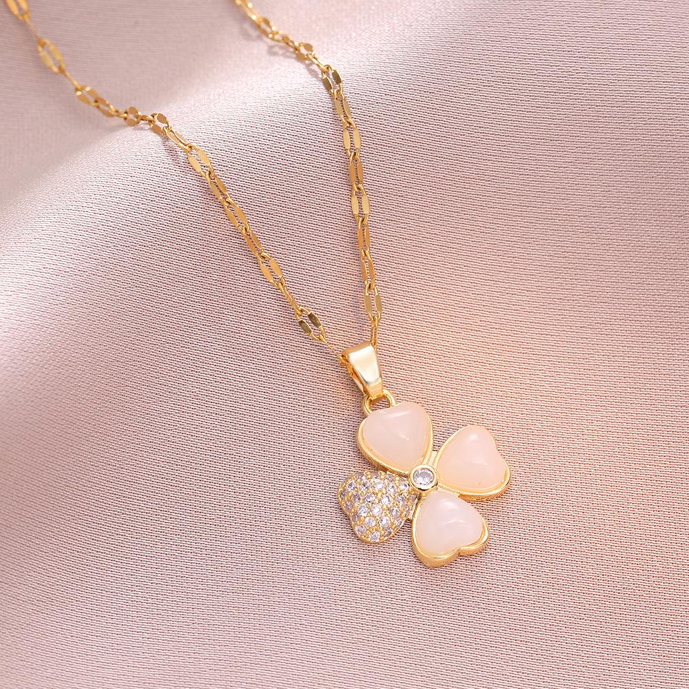 Women's Titanium Steel Necklace - Four-Leaf Zircon Flower & Cat's Eye Stone Pendant, New Design.